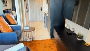 Deluxe Studio Suite, Courtyard View | Desk, laptop workspace, blackout drapes, soundproofing - The Lennox  (Accra)