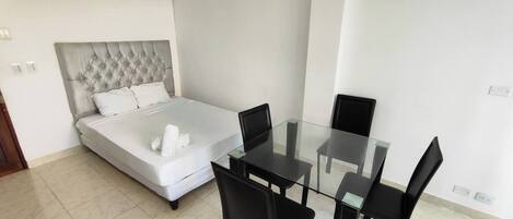 Basic Apartment | Living area | Flat-screen TV