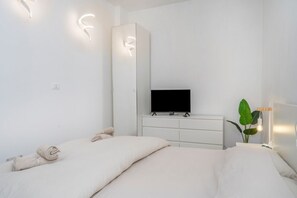 2 habitaciones, tabla de planchar con plancha, wifi y ropa de cama
