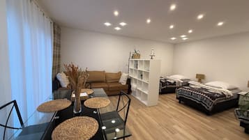 Casa Confort | Área de sala de estar | Televisión LED, Netflix, piso con calefacción y servicios de streaming