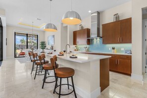 Fridge, microwave, oven, stovetop - Waterfront Luxury, Heated Saltwater Pool & Spa, Dock w/Tiki, Kayaks - Villa Tarpon Time - Roelens (Cape Coral)