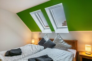 2 slaapkamers, een strijkplank/strijkijzer, gratis wifi, beddengoed