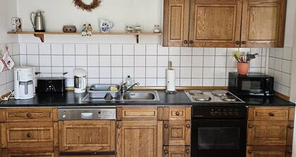 Casa de vacaciones 'Wiesenblick' con terraza privada y jardín compartido