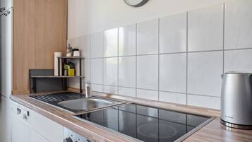 Réfrigérateur, four, plaque de cuisson, lave-vaisselle