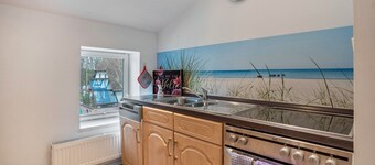 Appartement 'Wohnung Obergeschoss' avec piscine partagée, terrasse privée et Wi-Fi