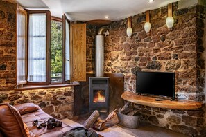 TV, fireplace - Rural House 'Aguas Del Sella - Jacuzzi' with Mountain Views and Shared Garden (Precendi)