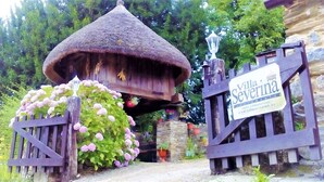 A rustic wooden gate with a sign for 'Villa Severina.' - Rural House 'Teixo' with Mountain Views, Private Terrace, and Wi-Fi (A Fonsagrada)