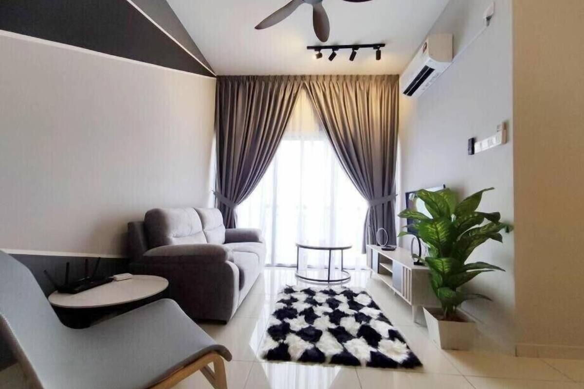 Standard Apartment | Living area | 32-inch flat-screen TV with digital channels