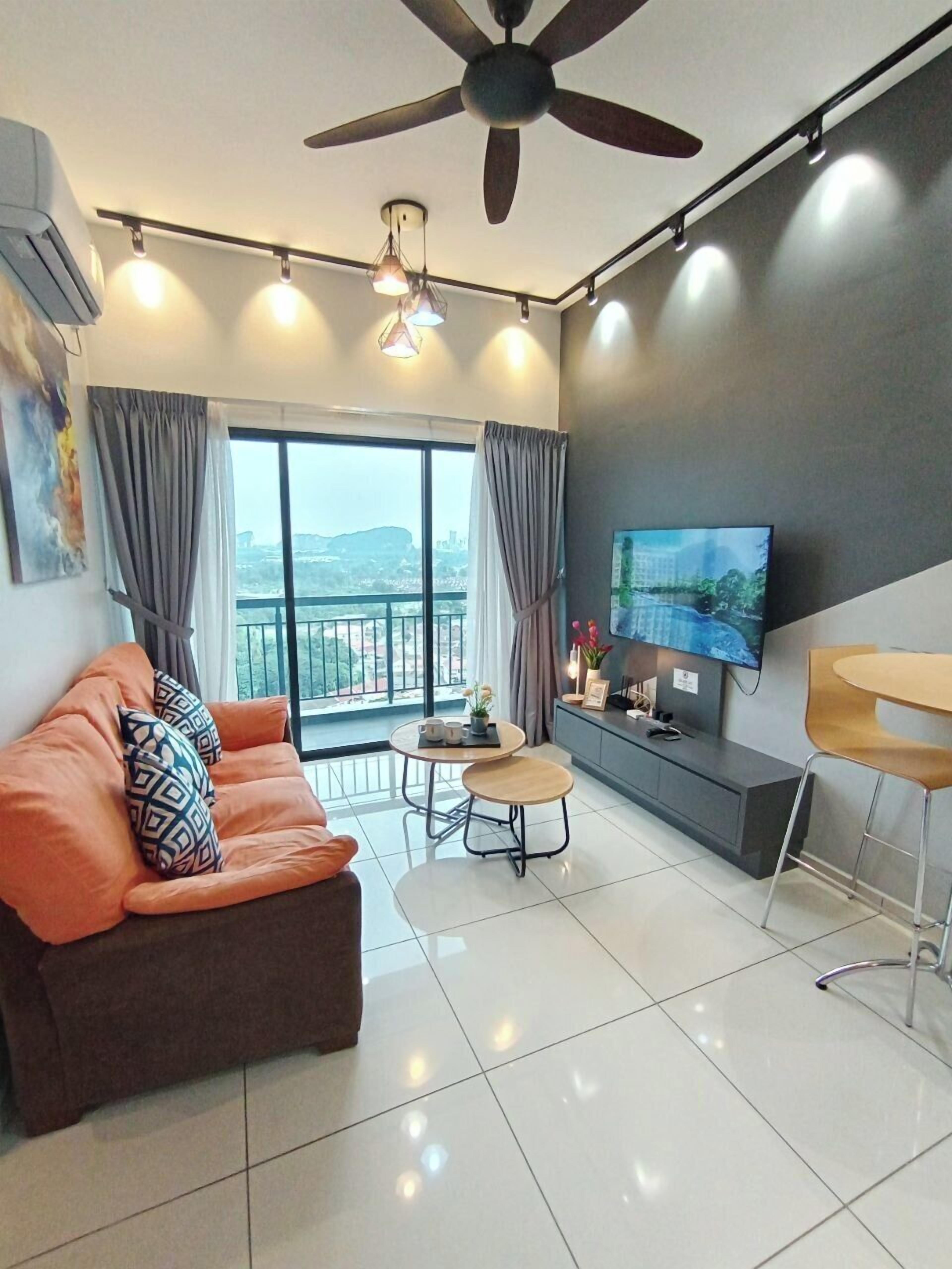 Superior Apartment | Living area | 32-inch flat-screen TV with digital channels