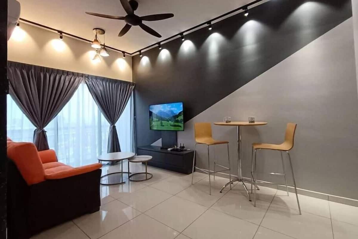 Superior Apartment | Living area | 32-inch flat-screen TV with digital channels