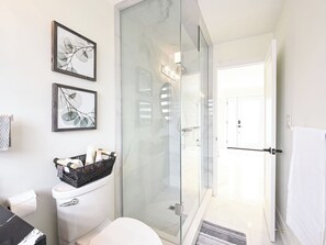 Shower, hair dryer, towels, soap