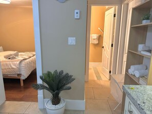 1 bedroom, desk, iron/ironing board, travel crib