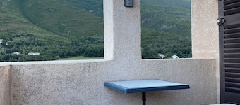 House in a picturesque village, sea and mountain views