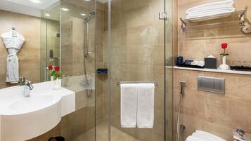 Shower, slippers, towels, soap