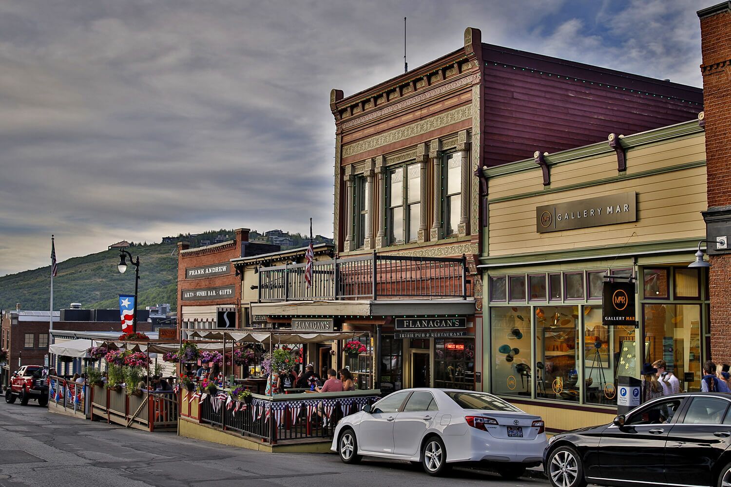 Historic downtown street features charming storefronts, nearby restaurants, and easy access to local attractions in the surrounding neighborhood.