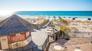Enjoy a refreshing drink at our beachside bar, where you can relax on the deck with ocean views.