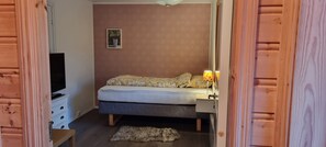 1 bedroom, desk, iron/ironing board, travel crib