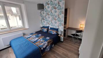 2 bedrooms, desk, iron/ironing board, travel crib
