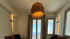 Apartment, Balcony, Sea View (Nico) | Living area | Flat-screen TV - Ico Santorini (Santorini)