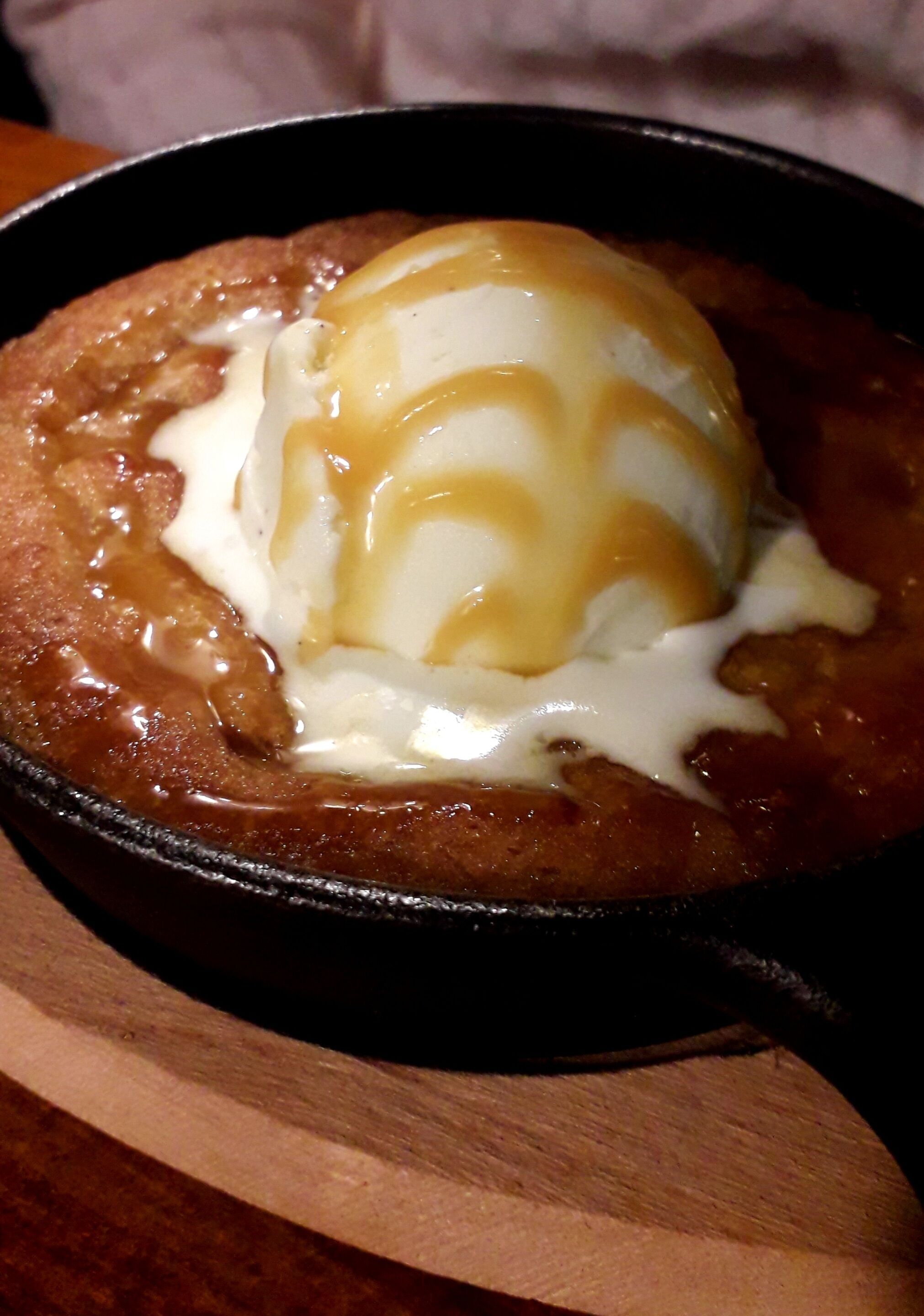 A dessert in a cast iron skillet.