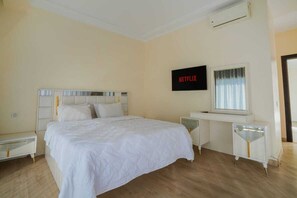 4 bedrooms, iron/ironing board, travel cot, WiFi