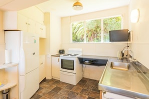 Fridge, microwave, toaster, cookware/dishes/utensils