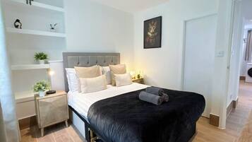 1 bedroom, desk, iron/ironing board, travel cot