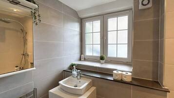 Eco-friendly toiletries, hair dryer, towels, soap