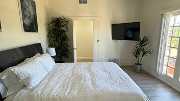 2 habitaciones, tabla de planchar con plancha, wifi y ropa de cama