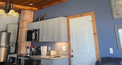 Country living in this cute one-bedroom renovated farmhouse from 1898.