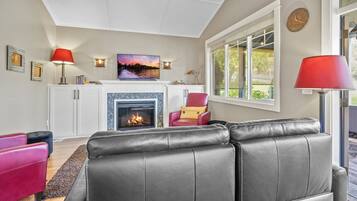 Smart TV, fireplace, table tennis, books