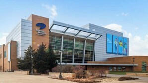 A Science Museum building with a modern glass facade and a prominent entrance. - Beautiful Four-Level Split Home @ Calm Cul-de-sac! (Roseville)