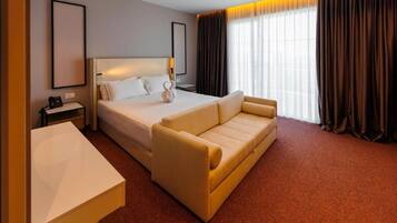 Deluxe Double Room, Balcony, Sea View | In-room safe, desk, blackout drapes, soundproofing