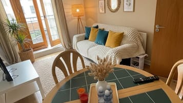 Comfort Apartment, Garden View | Living area