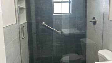 Shower, towels, soap, shampoo