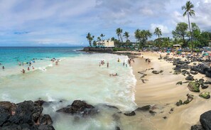 On the beach, sun-loungers, beach towels