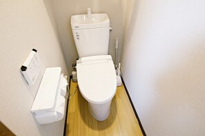 Hair dryer, bidet, towels, soap