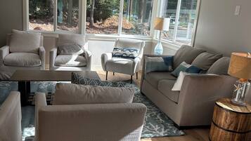 Smart TV, fireplace, foosball, books