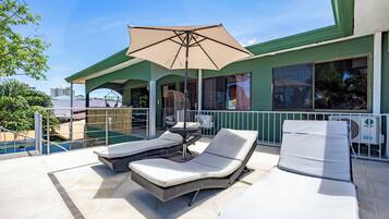 Deluxe Duplex, Multiple Beds, Private Bathroom, Garden View | Terrace/patio