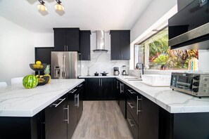 Fridge, microwave, cookware/dishes/utensils