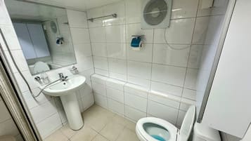 Hair dryer, towels, soap, shampoo