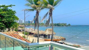 Suite Deluxe, balcón, vista a la playa | Balcón