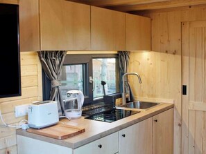 Fridge, stovetop, toaster, cookware/dishes/utensils