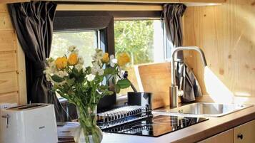 Fridge, stovetop, toaster, cookware/dishes/utensils