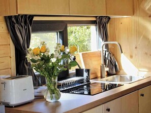 Fridge, stovetop, toaster, cookware/dishes/utensils