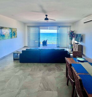 Living area - peaceful beachfront condo with pool, sleeps 9 with full kitchen (Akumal)