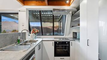 Coffee/tea maker, fridge, microwave, oven