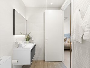 Shower, hair dryer, towels