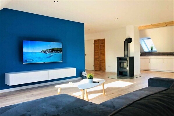 Fernseher, Kamin