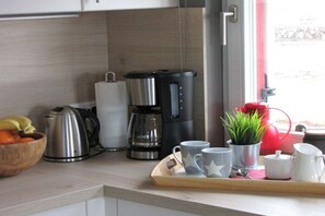 Oven, stovetop, dishwasher, coffee/tea maker